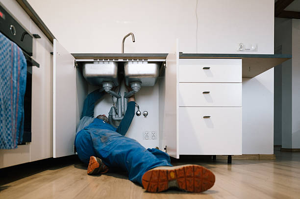Professional Emergency Plumber technician working in Milaca, MN